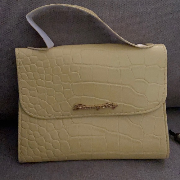 sunny city Handbags - Sunny city hang bag